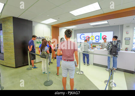 Mountain View, California, United States - August 13, 2018: interior of Merchandise Store of Google that sells T-shirts, hats, mugs and souvenirs with Google, YouTube, Android and branding. Stock Photo