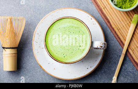 Matcha green tea latte in a cup. Top view Stock Photo