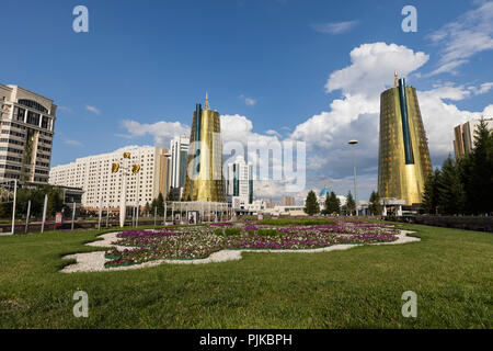 Astana, Kazakhstan, August 2 2018: The Colden Towers (Beer Cans) near the Ak Orda Presidential Palace in Astana, the capital of Kazakhstan Stock Photo