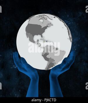 Jamaica with flag on globe in hands in space. 3D illustration. Stock Photo