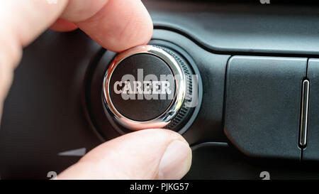 Man turning a dial or electronic control knob with the word Career on the top in a conceptual image. Stock Photo