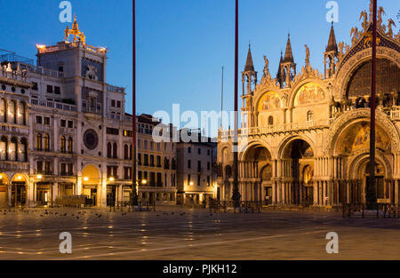 Venice, St Mark's Square with St Mark's Clock Tower and St Mark's Basilica, morning mood Stock Photo
