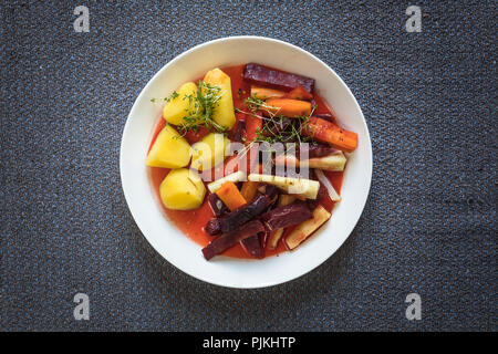 Mixed winter vegetables with potatoes on plate Stock Photo