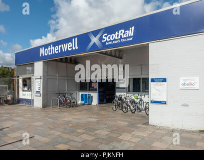 Main entrance to Motherwell ScotRail train station in North Lanarkshire, Scotland, with the Meet n Eat snack kiosk and bicycle racks.