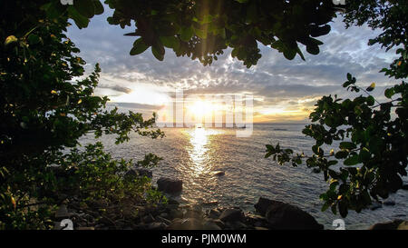 Sunset over the sea on Apo Island, Philippines Stock Photo