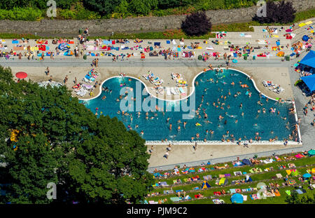 Swimming pool outdoor pool Annen in Witten, swimming pool with wavy edge, lawns and loungers, bathers in the swimming pool Annen, Witten, Ruhr area, North Rhine-Westphalia, Germany Stock Photo