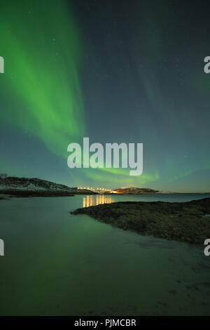 Europe, Norway, Troms, dancing Northern Lights over Kvaløya Stock Photo