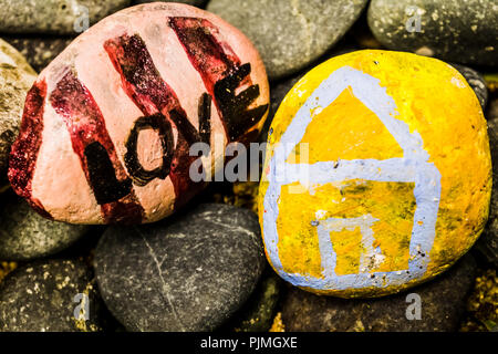 Stone painting - LOVE, Home Stock Photo