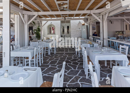 PAROS, GREECE - MAY 3, 2013: Old white house and Bay in Naoussa town, Paros island, Cyclades, Greece Stock Photo