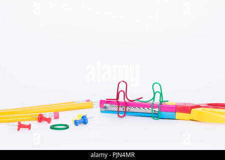 Colorful zigzag scissors with color paper isolated on white Stock Photo -  Alamy
