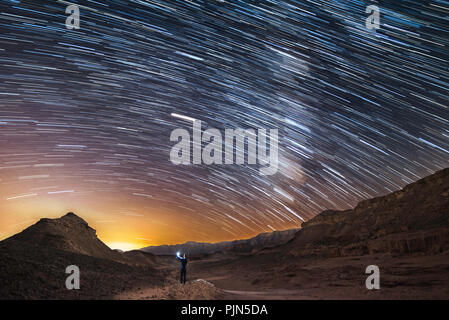 Beautiful milky way at White Pocket Wilderness touring spot in Arizona desert. Stock Photo