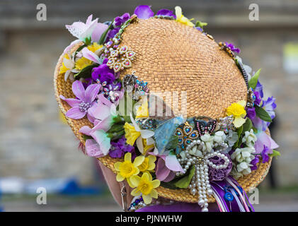 Swanage, Dorset, UK. 8th Sep, 2018. Crowds flock to the Swanage Folk Festival to see the dance groups and music along the seafront. Close up detail of womans Easter bonnet hat with flowers, jewellery and pearls. Credit: Carolyn Jenkins/Ģ����ý Live News Stock Photo