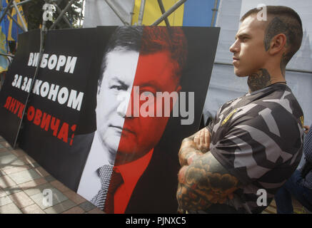 Kiev, Ukraine. 6th Sep, 2018. An Ukrainian Activist Stands Next To A 