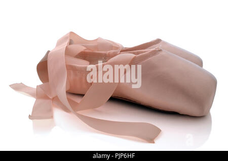 Brand new ballet shoes isolated on white background . Stock Photo