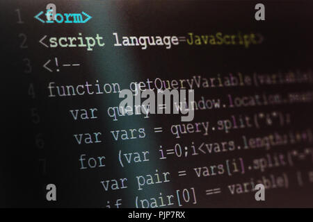 Close up macro shot selective focus of java script programming language on computer screen. Stock Photo