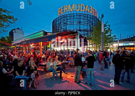 Many people at dusk in the entertainment district of Bemudadreieck, Bochum, Ruhr Area, North Rhine Westphalia, Germany Stock Photo