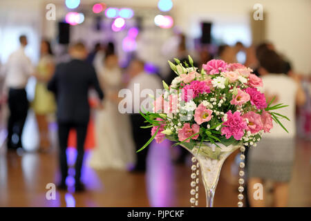 Dancing couples during party or wedding reception Stock Photo
