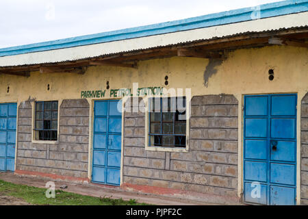 kenyan masai villages along the road to go to the masai mara reserve Stock Photo