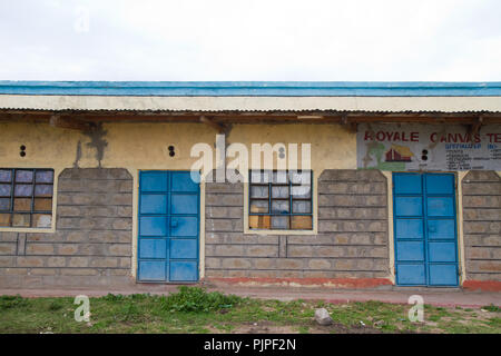 kenyan masai villages along the road to go to the masai mara reserve Stock Photo