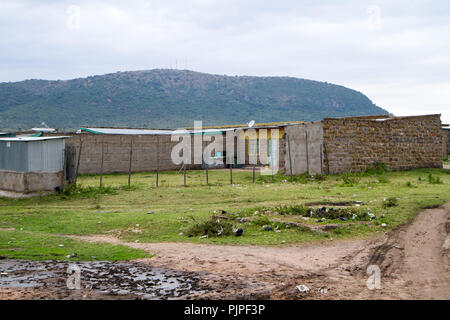 kenyan masai villages along the road to go to the masai mara reserve Stock Photo