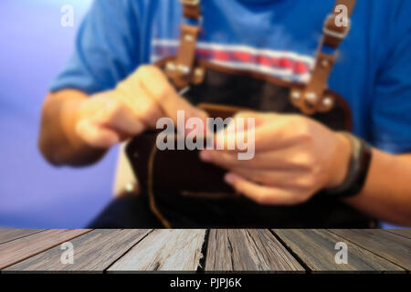 craftsman sewing making leather bag. handmade DIY handicraft workshop Stock Photo