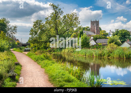 The Grand Western Canal runs through the middle of the picturesque Devon village of Sampford Peverell Stock Photo