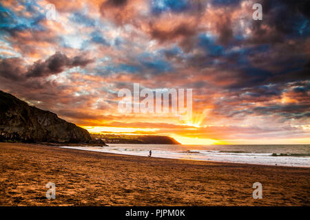 Sunset over the beach at Tresaith in Ceredigion, Wales, looking towards Aberporth. Stock Photo