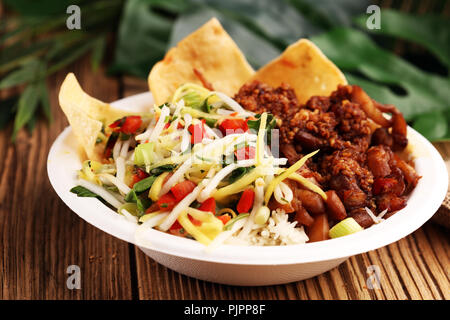 Nasi Campur Bali. Popular Balinese meal of rice with meat. Typical Malaysian street food lunch mixed rice Stock Photo