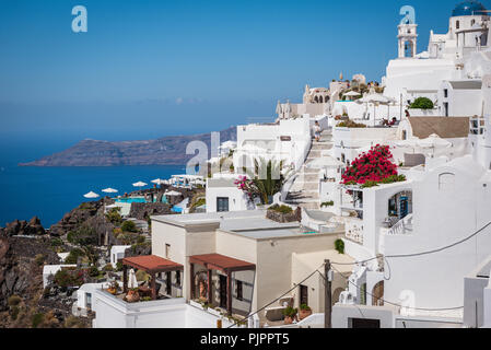 SANTORINI, GREECE - AUGUST 2018: Traditional Greek architecture of Santorini island with beautiful view on volcanic caldera Stock Photo