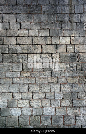 Closeup courses of stone in the wall of a 17th Century Barn Stock Photo