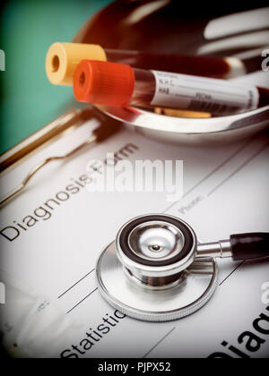 Diagnostic form, Vial of blood samples and Medicine in a hospital, conceptual image Stock Photo
