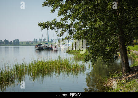 RYN, WARMIA-MASURIA PROVINCE / POLAND - JULY 31, 2018: Marina and pier on Rynskie lake, town of Ryn. Stock Photo