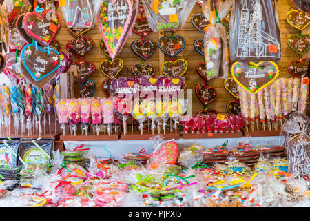 Souvenir gingerbread of different shapes on one of the traditional market in Cracow, Poland. Stock Photo