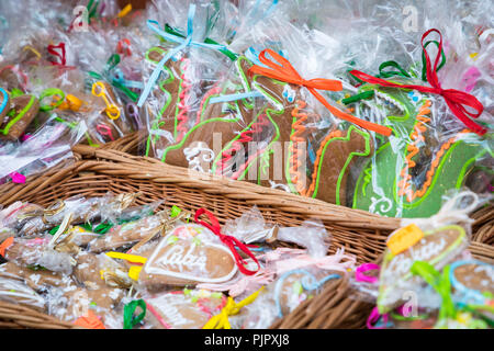Souvenir gingerbread of different shapes on one of the traditional market in Cracow, Poland. Stock Photo