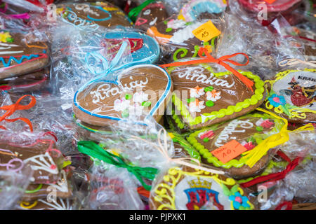Souvenir gingerbread of different shapes on one of the traditional market in Cracow, Poland. Stock Photo