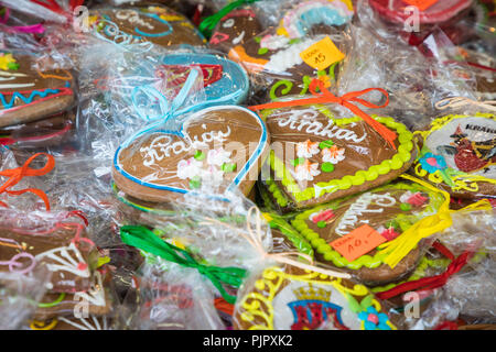 Souvenir gingerbread of different shapes on one of the traditional market in Cracow, Poland. Stock Photo