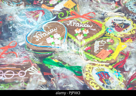 Souvenir gingerbread of different shapes on one of the traditional market in Cracow, Poland. Stock Photo