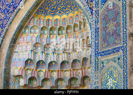 Decorative patterns and architectural details at the main entrance of Abdullaziz Khan madrasah in Bukhara, Uzbekistan Stock Photo