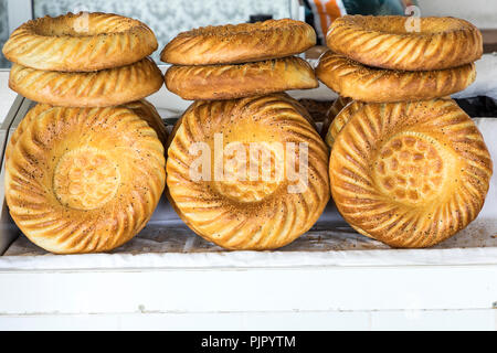 Traditional uzbekistan bread lavash at local bazaar, is a soft flat-bread of Middle Asia (Uzbekistan). Stock Photo