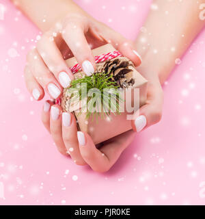 Female hands holdin gift box Stock Photo