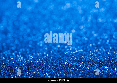 Shiny blue abstract christmas background. Blue glitter. Stock Photo