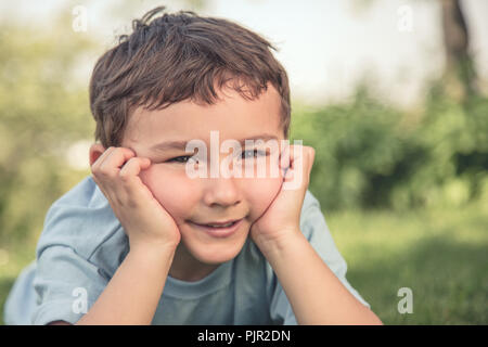 Child kid little boy thinking looking retro style outdoor copyspace copy space outdoors outside nature Stock Photo