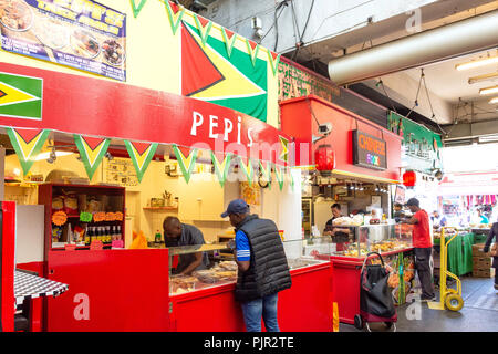 Interior restaurants in Tooting Market, Tooting High Street, Tooting, London Borough of Wandsworth, Greater London, England, United Kingdom Stock Photo