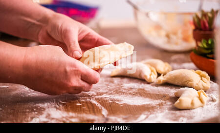 Step by step. Making home made empanadas with different fillings. Stock Photo