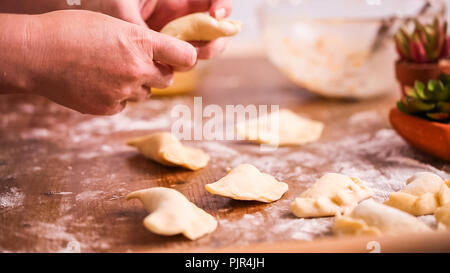 Step by step. Making home made empanadas with different fillings. Stock Photo