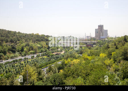 Ariel photo for Tehran city in Islamic Republic of Iran, which show Streets and buildings and some cars and some trees. Stock Photo
