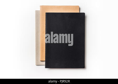 Design concept - Top view of many notebooks isolated on white background for mockup Stock Photo