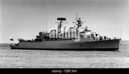 AJAXNETPHOTO. (PMO1) 29 MAY 1982. PORTSMOUTH, ENGLAND. - ON TRIALS - FLYING THE FLAG OF THE PAKISTAN NAVY AND RENAMED 'BURDA' , THE DESTROYER EX HMS LONDON ENTERS HARBOUR.  PHOTO:JONATHAN EASTLAND/AJAX. REF:290582 Stock Photo