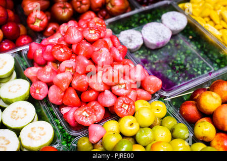 Wax apple and tropical fruits in a fruit salad store Stock Photo