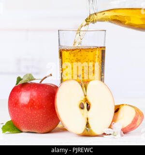 Apple juice pouring pour apples fruit fruits square squared Stock Photo